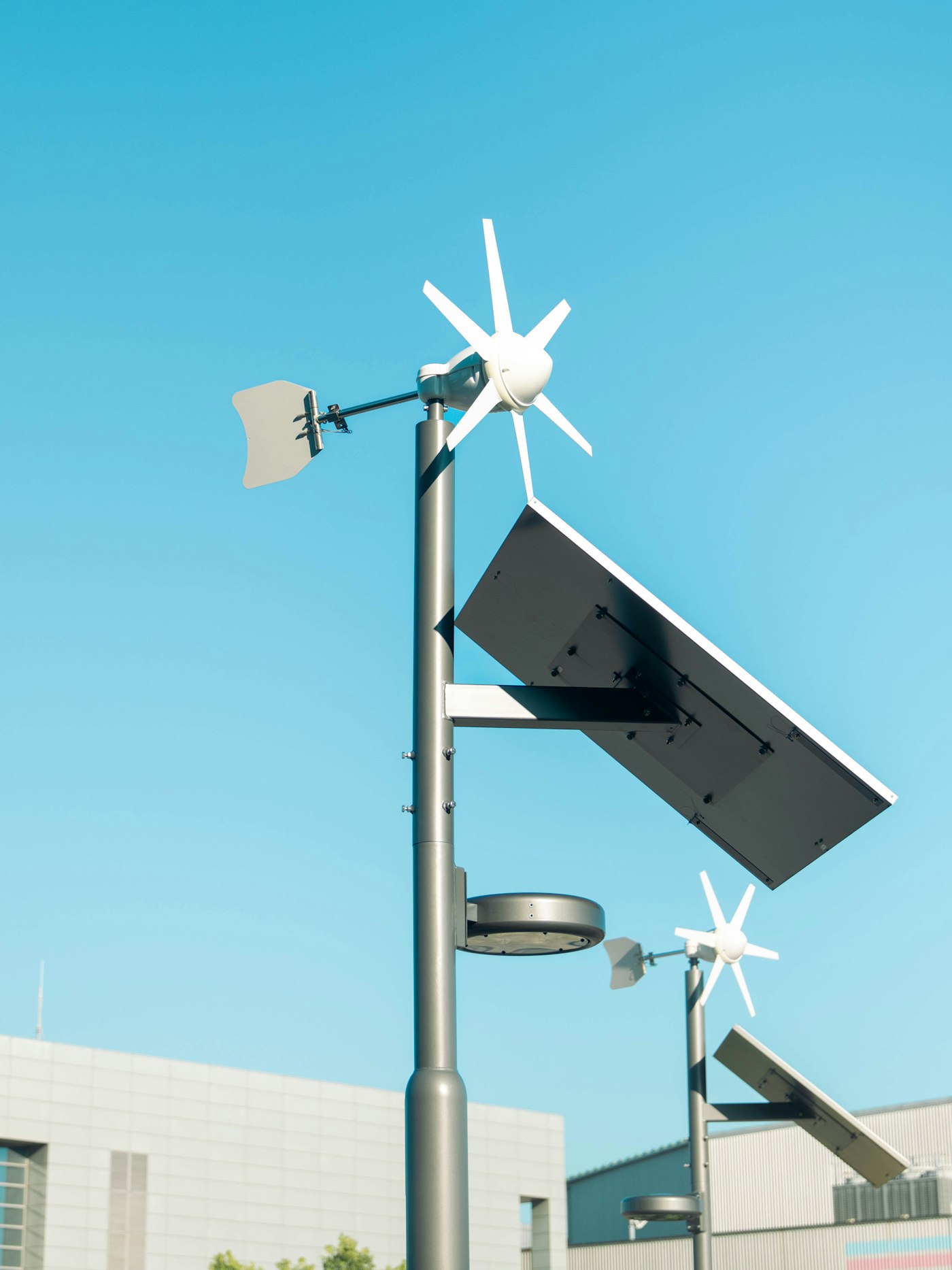 Solar street light with pole-mounted panel